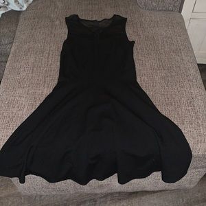 Mid length black dress